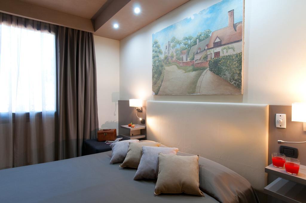Holiday Rooms Antica Badia Volterra Rum bild